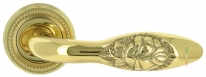 Ручка дверная на круглой розетке Extreza MIREL-R R03 полированное золото F01