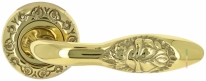 Ручка дверная на круглой розетке Extreza MIREL-R R04 полированное золото F01