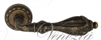 Ручка дверная на круглой розетке Venezia Anafesto D2 Бронза античная