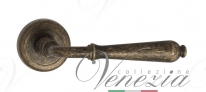 Ручка дверная на круглой розетке Venezia Classic D1 Бронза античная