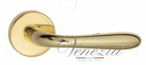 Ручка дверная на круглой розетке Fratelli Cattini GOCCIA 7-OLV Латунь блестящая