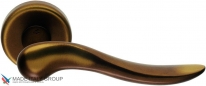 Дверная ручка на круглой розетке COLOMBO Peter ID11R-BR бронза
