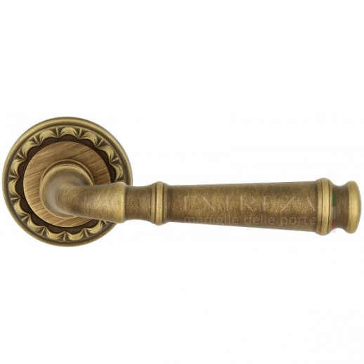 Ручка дверная на круглой розетке Extreza BONO (Боно) 328 на розетке R02 матовая бронза F03