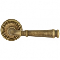 Ручка дверная на круглой розетке Extreza BONO (Боно) 328 на розетке R03 матовая бронза F03