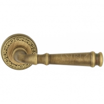 Ручка дверная на круглой розетке Extreza BONO (Боно) 328 на розетке R06 матовая бронза F03