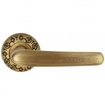 Ручка дверная на круглой розетке Extreza MONACO (Монако) 330 на розетке R04 матовая бронза F03