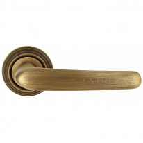 Ручка дверная на круглой розетке Extreza MONACO (Монако) 330 на розетке R05 матовая бронза F03