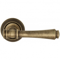Ручка дверная на круглой розетке Extreza PIERO (Пиеро) 326 на розетке R05 матовая бронза F03