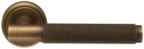 Дверная ручка Extreza TUBA (Туба) 126 на розетке R01 матовая бронза F03