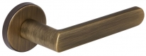 Дверная ручка Extreza Hi-Tech Slim AQUA (Аква) 113 на круглой розетке R12 матовая бронза F03