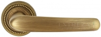 Дверная ручка Extreza MONACO (Монако) 330 на розетке R03 матовая бронза F03