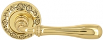 Дверная ручка Extreza CARRERA (Каррера) 321 на розетке R04 полированная латунь F01