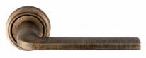 Extreza TERNI (Терни) 320 дверная ручка на розетке R01, цвет матовая бронза F03