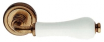 Дверная ручка LINEA CALI на круглой розетке "DALIA" 600 RO 103 OG бронза